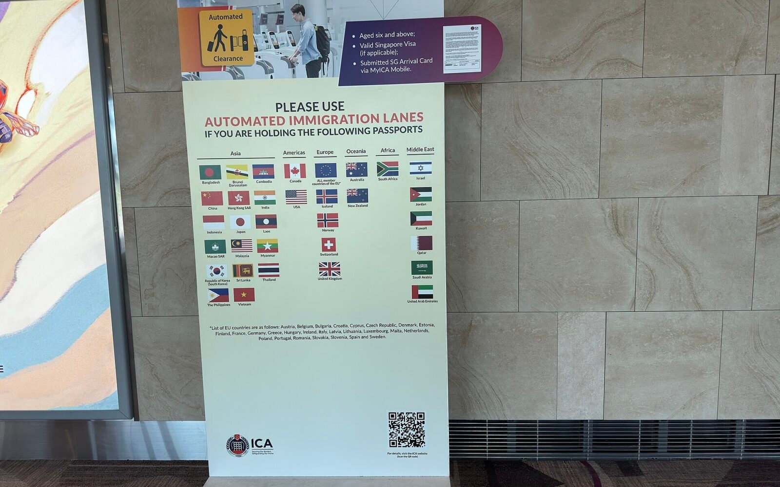 Traveler preparing for passport control at an airport